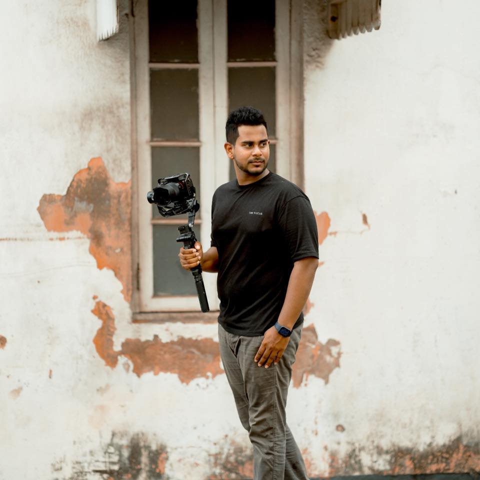 Mr Focus holding a camera